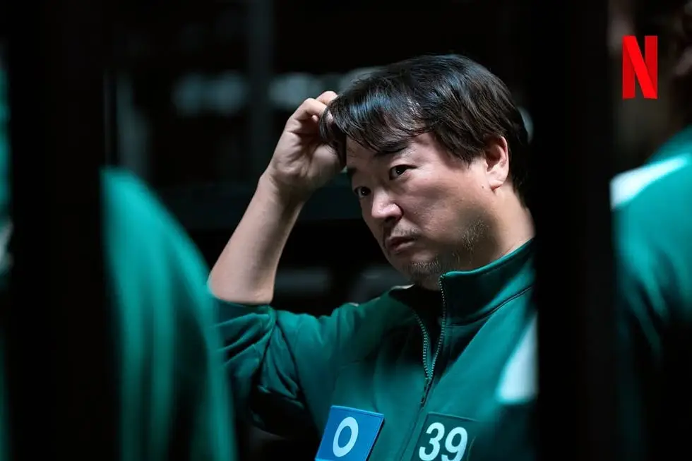 鱿鱼游戏2崔胜铉_《鱿鱼游戏2》成奇勋与001关系_鱿鱼游戏2结局悬念